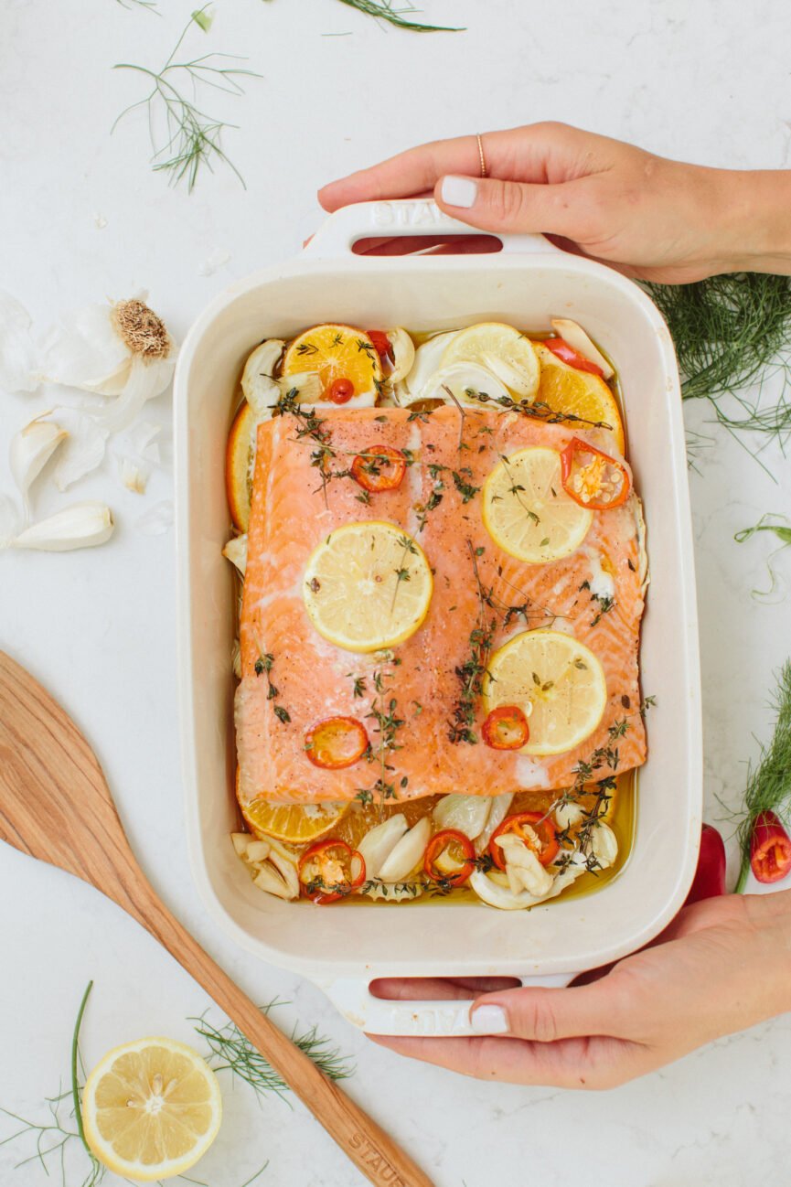 baked salmon in white staub baking dish