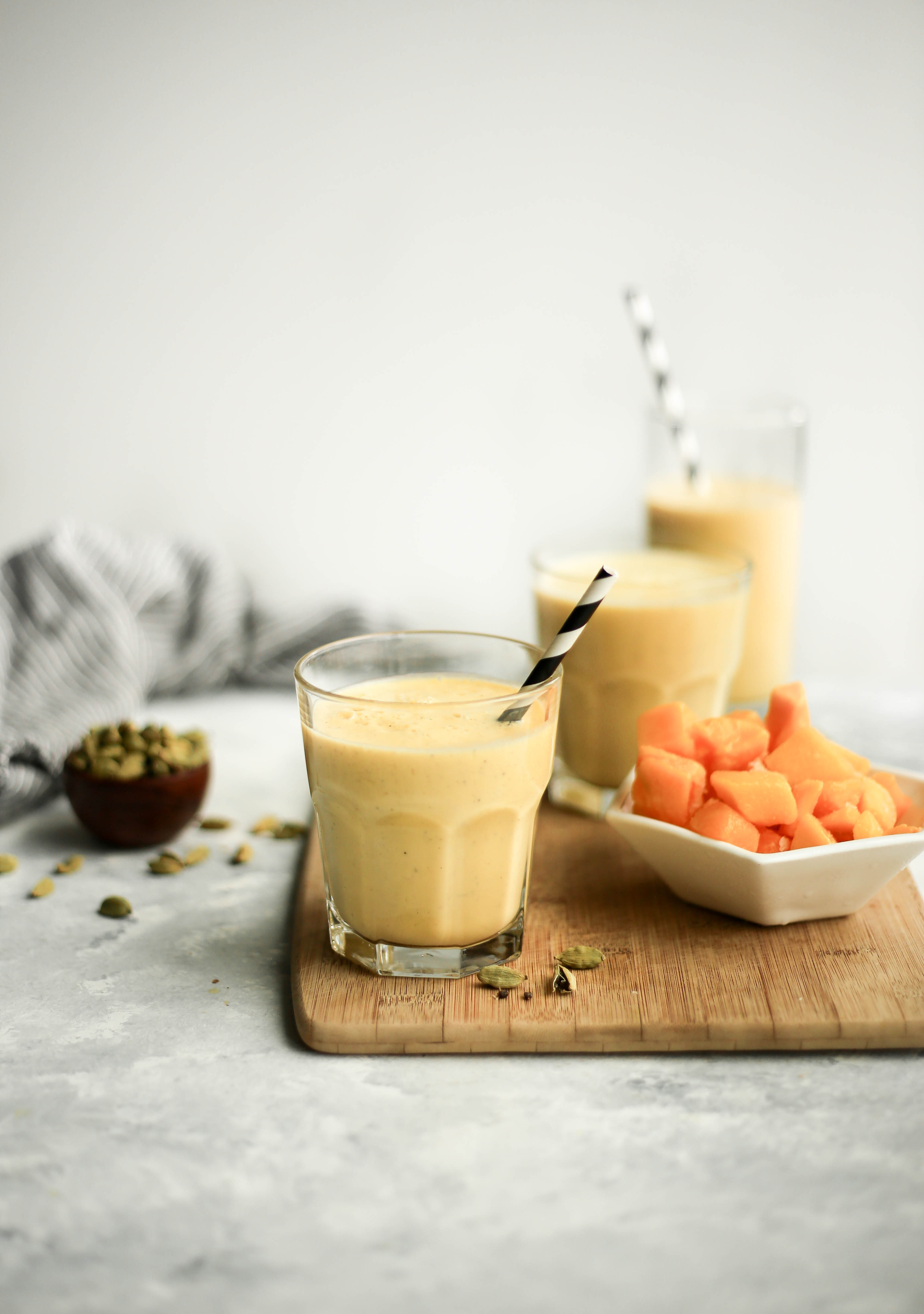 salty mango lassi - a refreshing summer drink with mango, black salt, yogurt, and cardamom