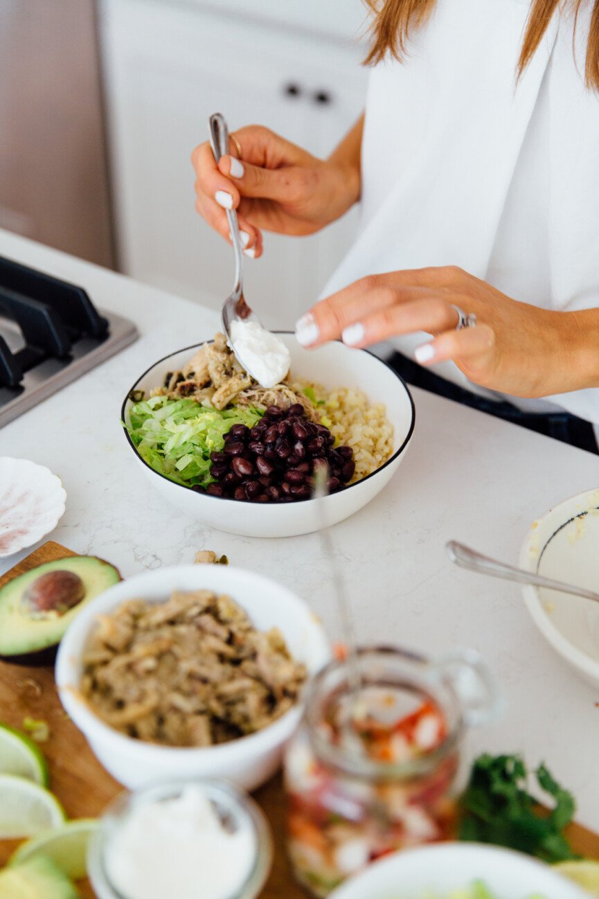 assembling slow cooker burrito bowl