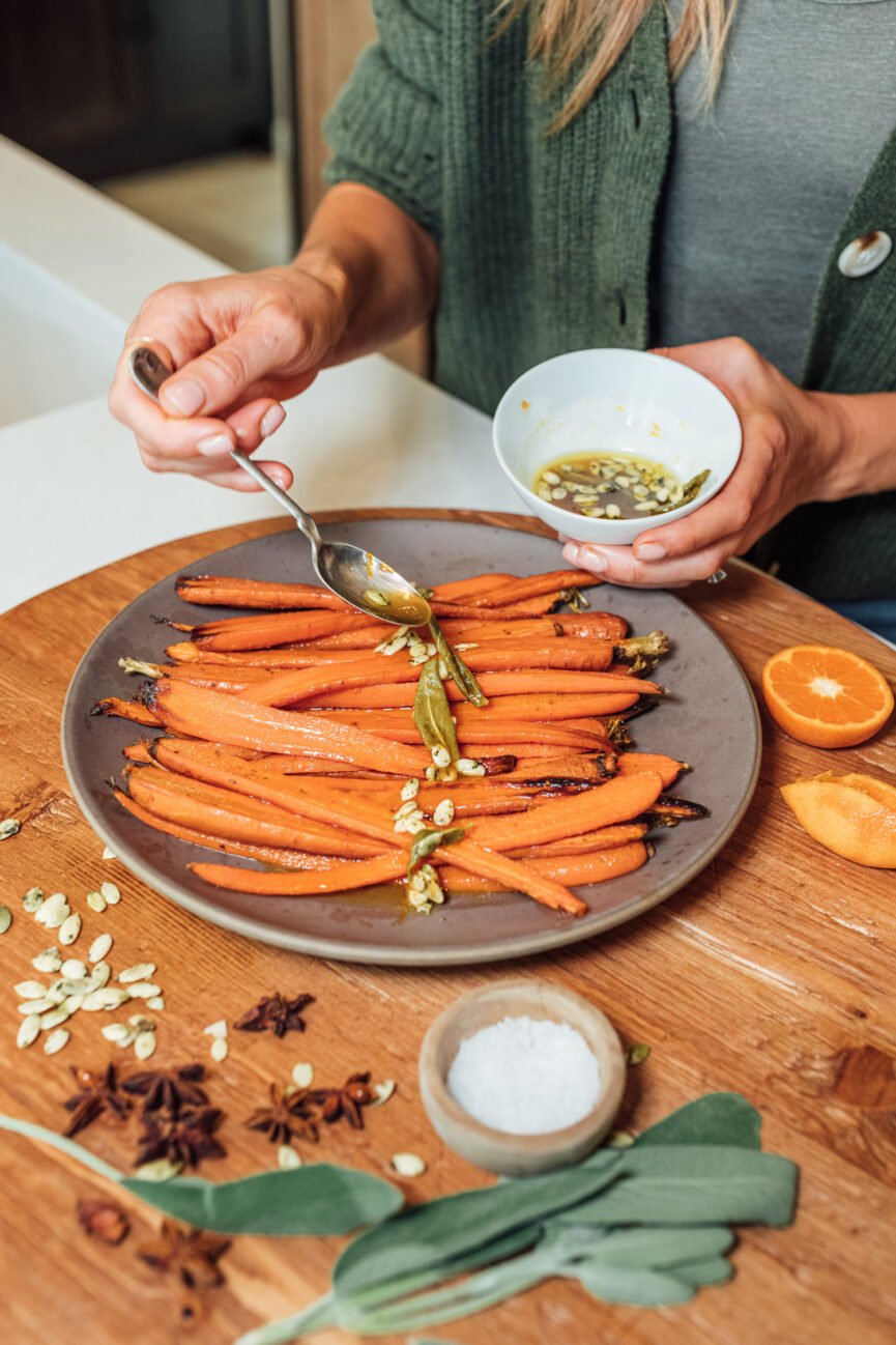honey roasted carrots with spicy citrus, sage, and pepitas