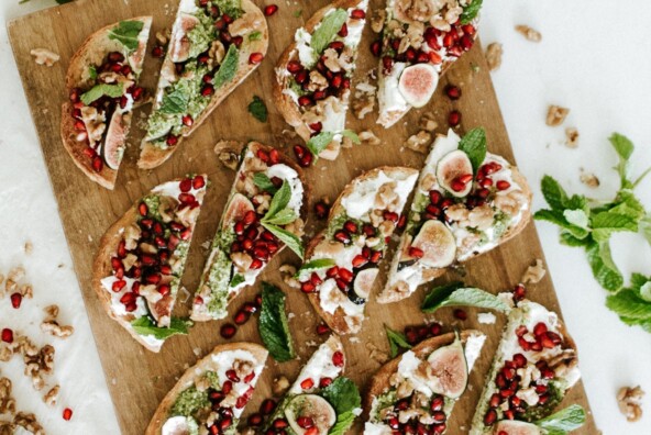 burrata toasts on serving tray