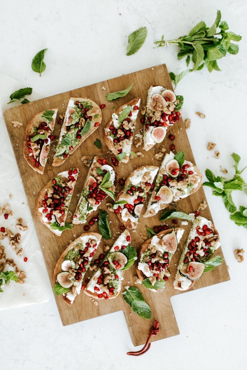 burrata toasts on serving tray