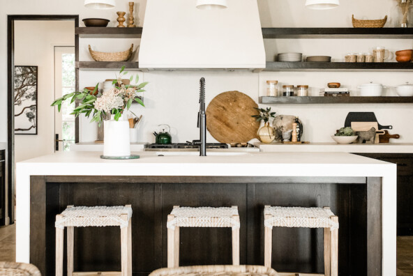 neutral white kitchen with plaster hood