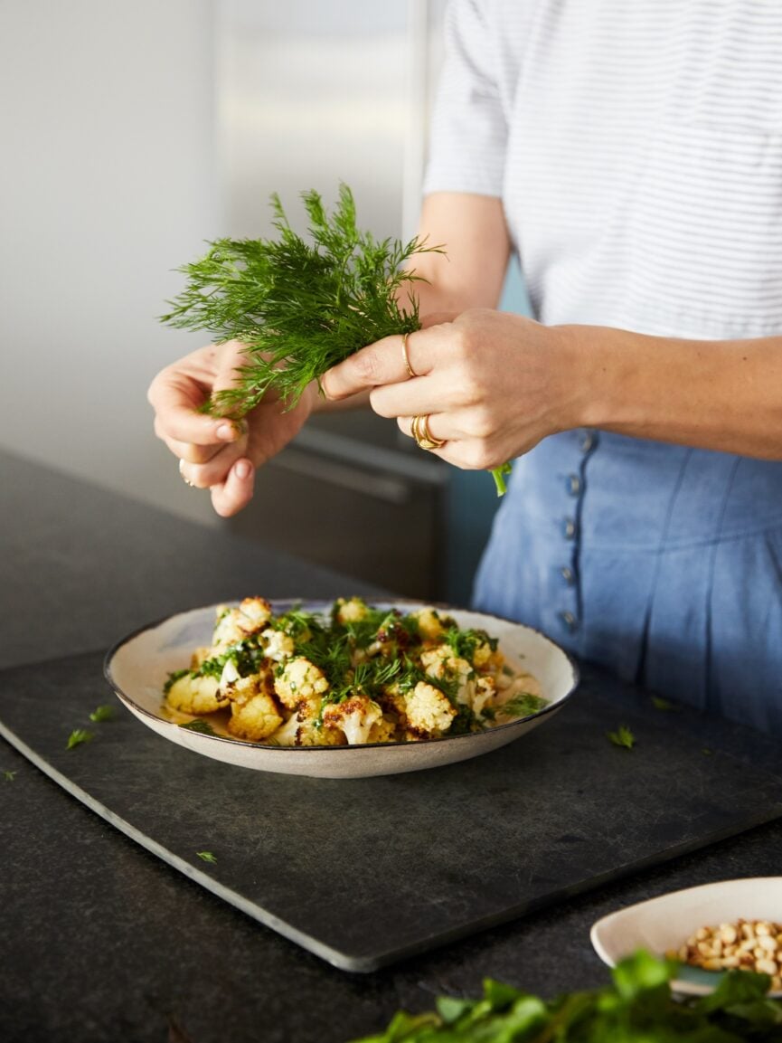 roasted cauliflower with garlic tahini, chimichurri, and dill