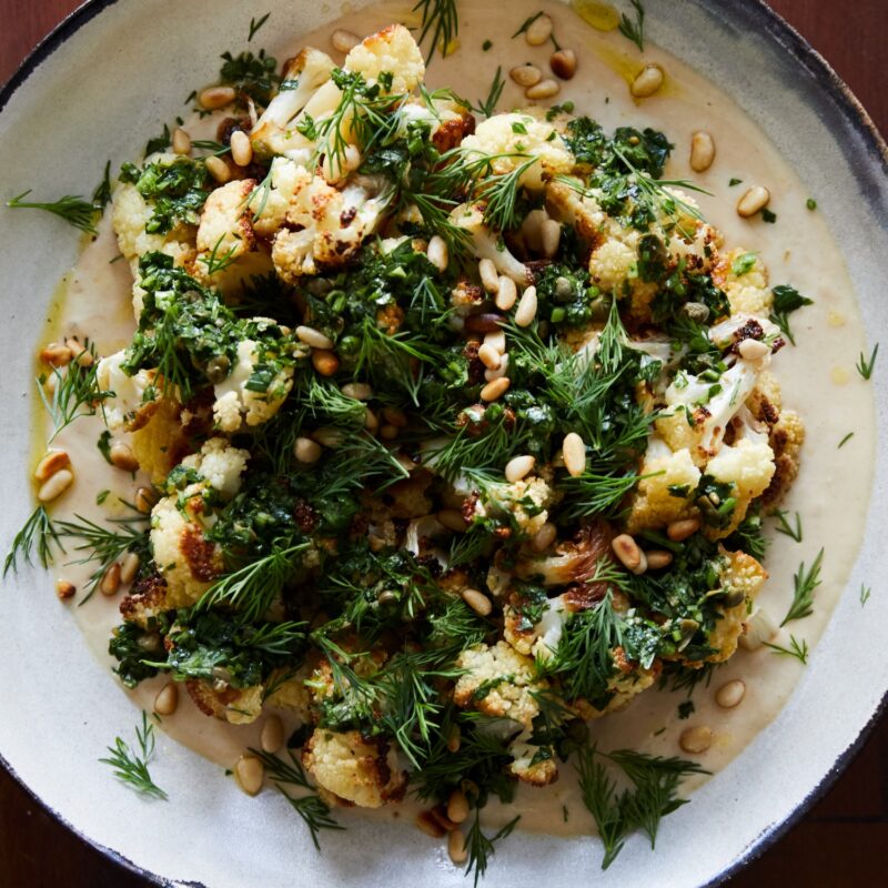 roasted cauliflower with garlic tahini, chimichurri, and dill