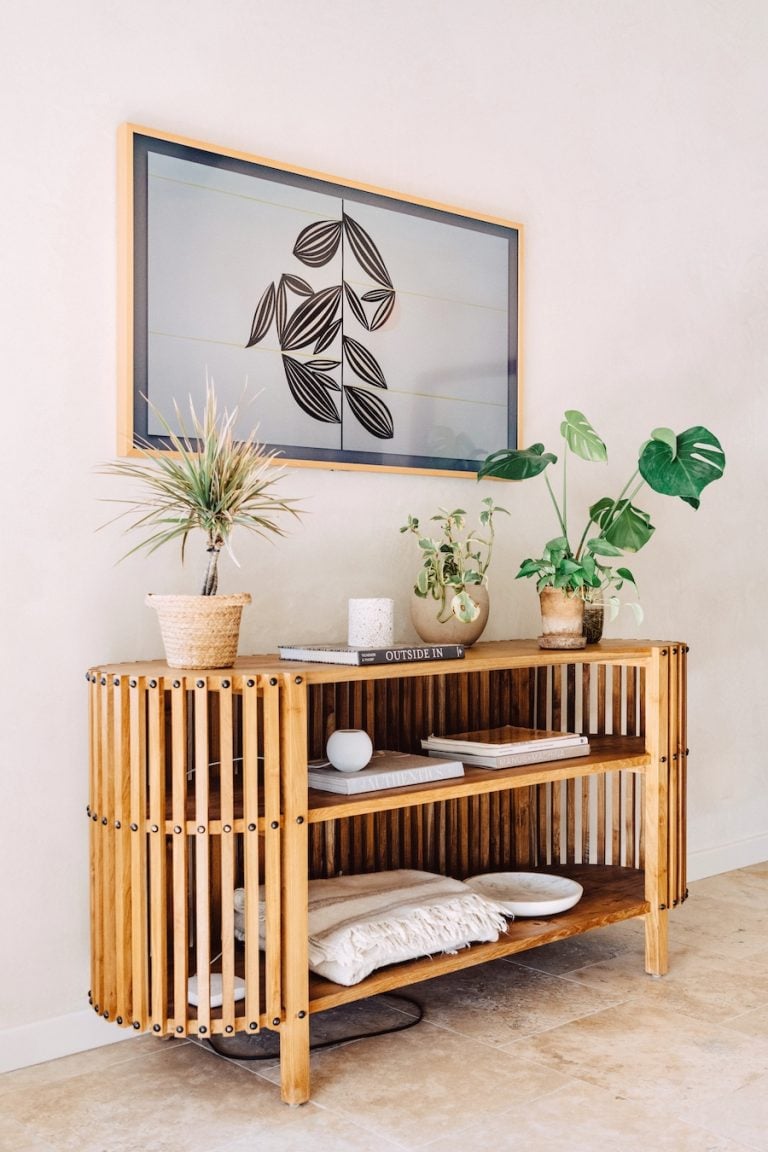 Camille Styles TV console table in the bedroom of the house