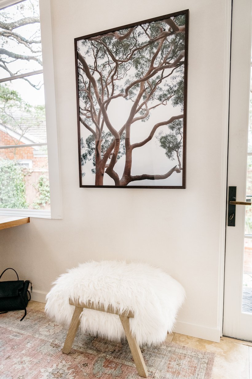 camille's home office with furry stool and eucalyptus photograph