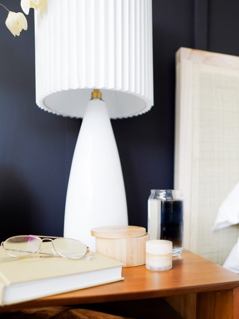 Anna Mae Groves, Stylemakers, bedroom, bedside table, lamp, navy, candle, glasses