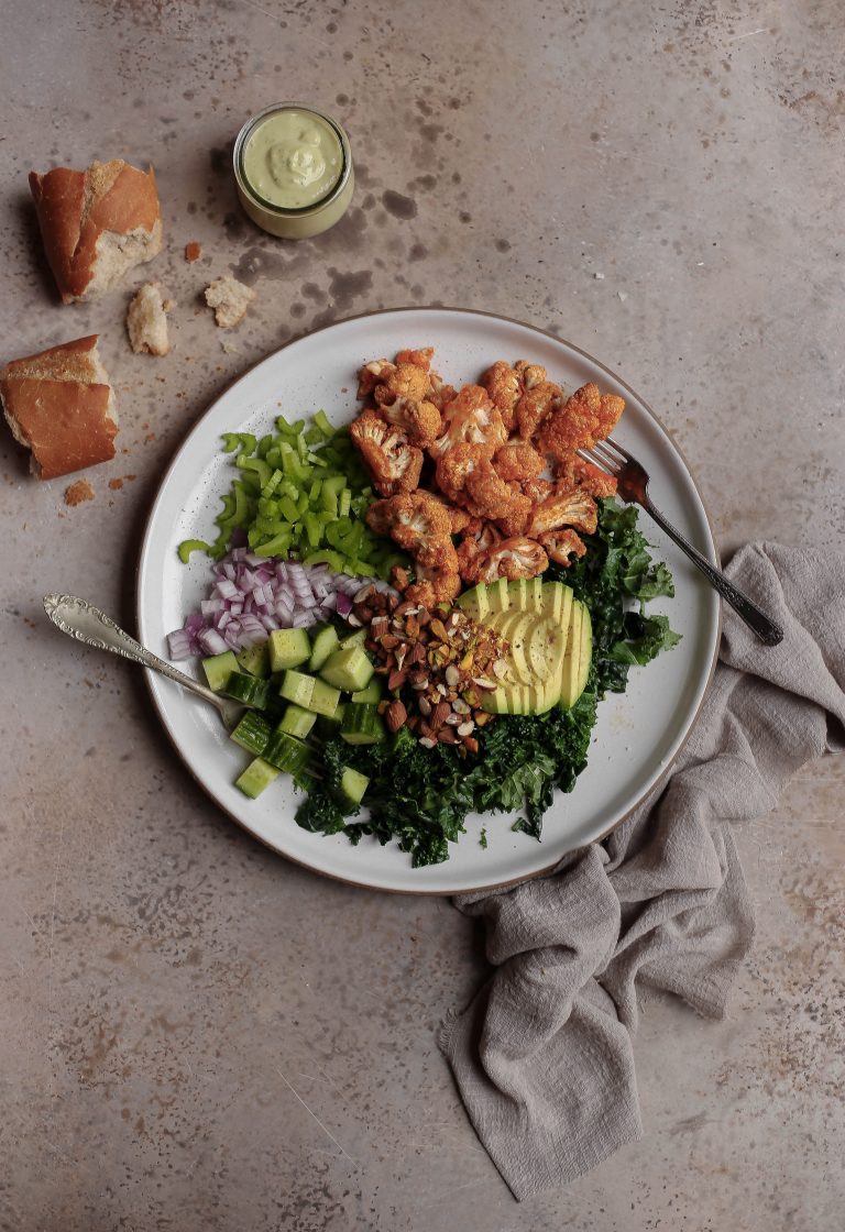 buffalo cauliflower chopped salad with basil garlic tahini dressing