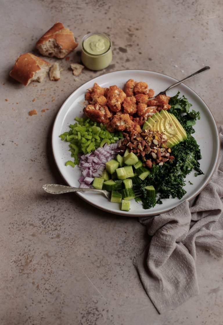 buffalo cauliflower chopped salad with basil garlic tahini dressing