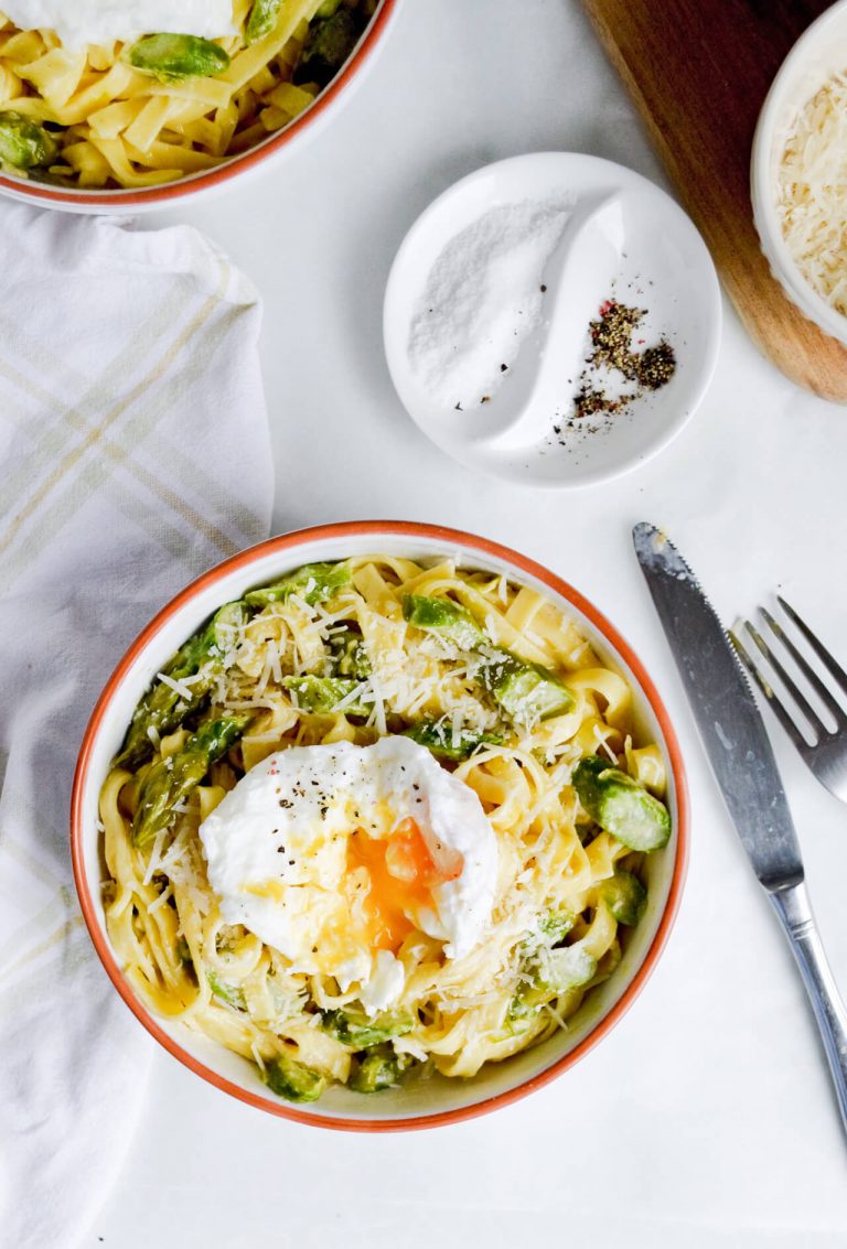 Creamy asparagus tagliatelle with poached eggs