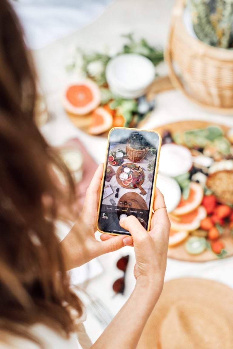 taking photos with phone - how to use planoly to plan your instagram feed