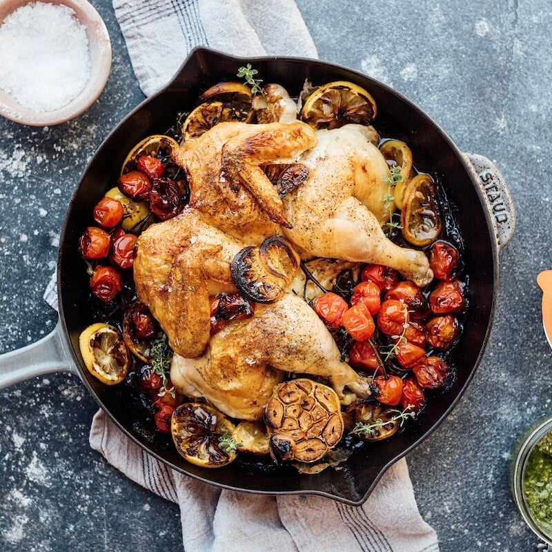 roast chicken with tomatoes, lemon, and cilantro salsa verde - best roast chicken recipe for crispy skin and juicy flavor