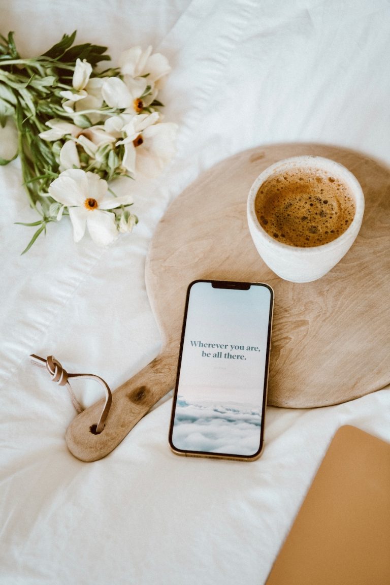 phone and coffee - how to get rid of anxiety on Instagram