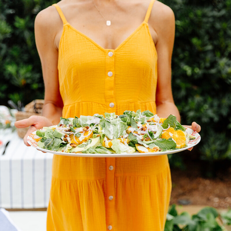summer backyard dinner party with target, salad, yellow dress