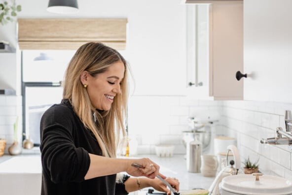 Woman cooking at stovetop