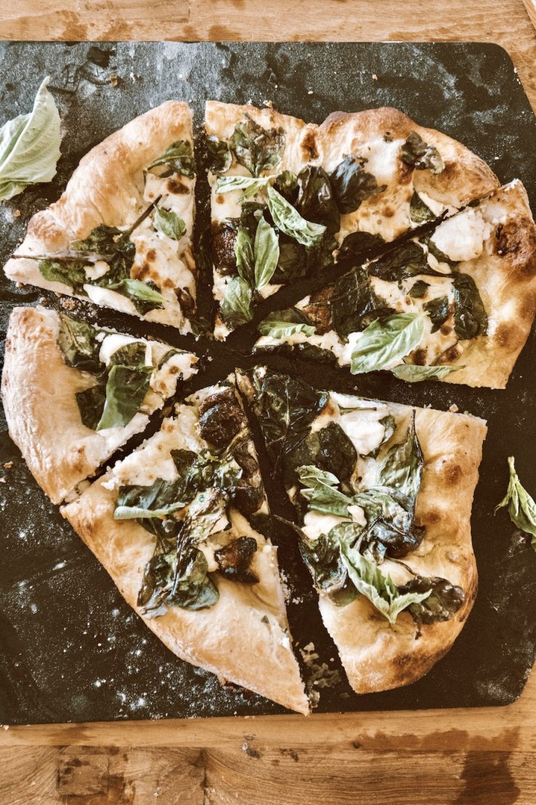 Camille Styles spinach ricotta homemade pizza recipe made with baked stone in pizza