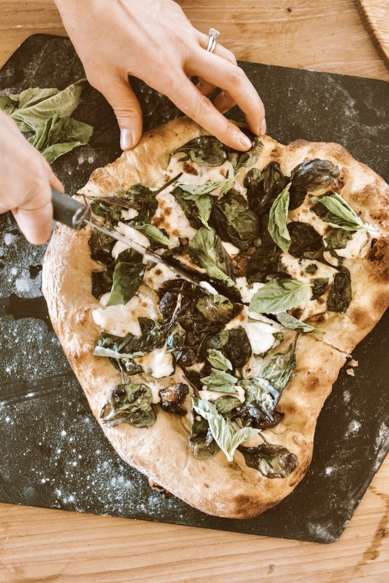 Camille Styles spinach ricotta homemade pizza recipe baked in oven on pizza stone