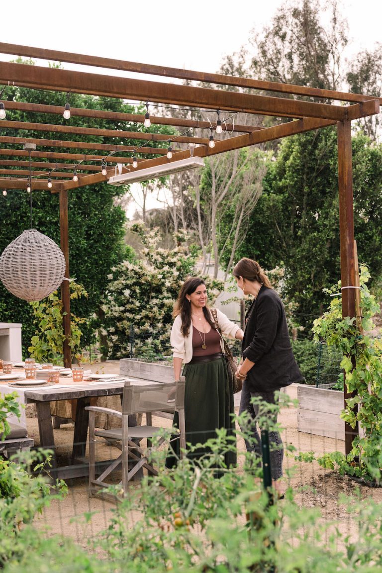 summer dinner party - beautiful backyard at sunset with covered terrace and pizza oven - helene henderson home - malibu farm