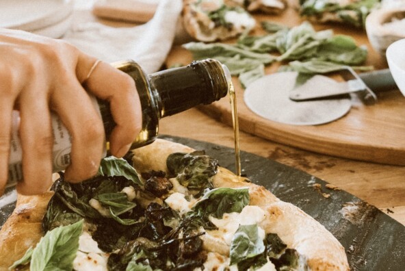 Camille Styles spinach and ricotta homemade pizza recipe baked in oven on pizza stone
