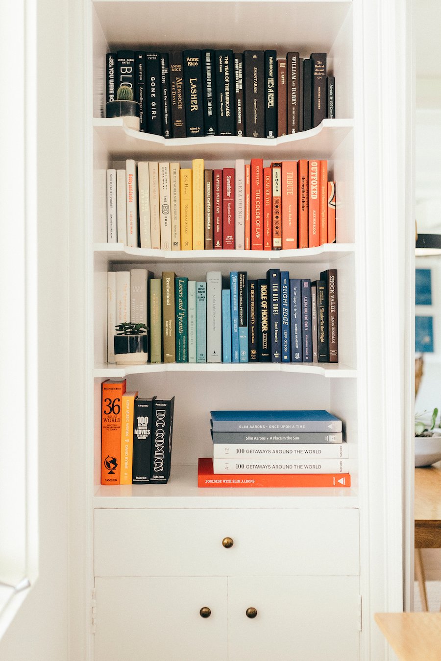 color coordinated bookshelves, catt sadler's home