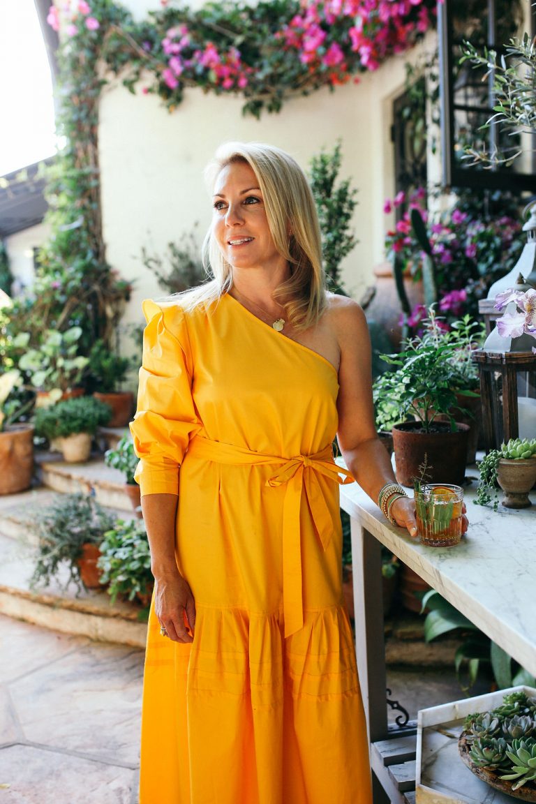 Valerie Rice dinner party, yellow dress, host