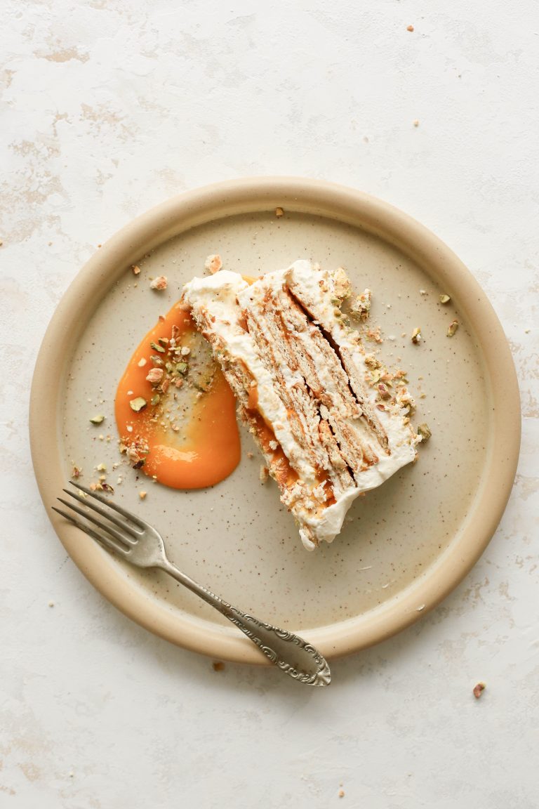 celebrate summer with this peace of mango and cardamom ice cream cake with crushed salted pistachio