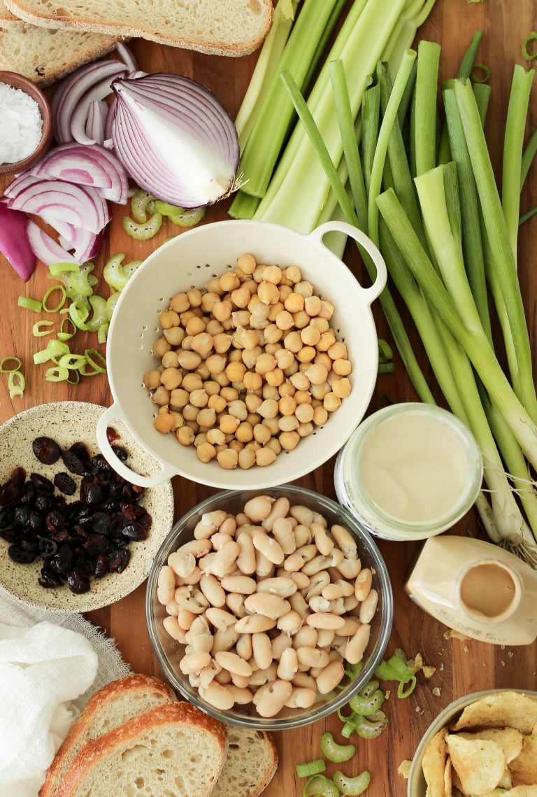 vegan chickpea salad sandwich with cannellini beans, celery and cranberries