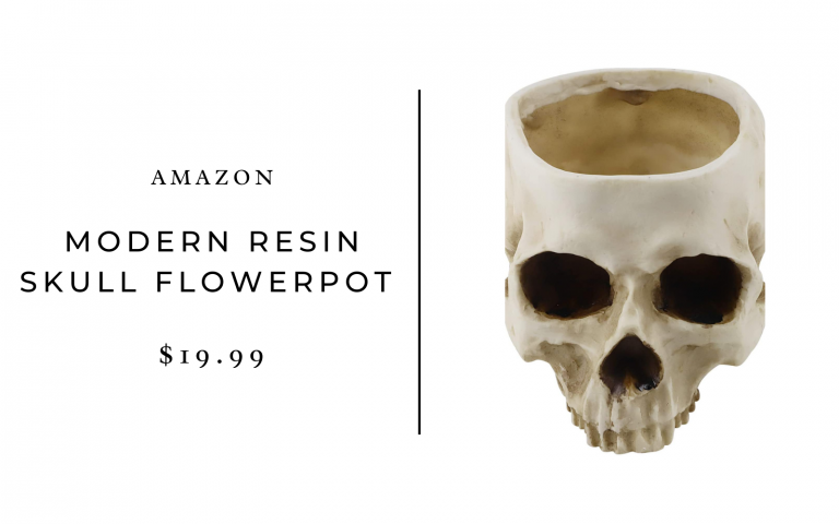 a resin-shaped vase in a skull