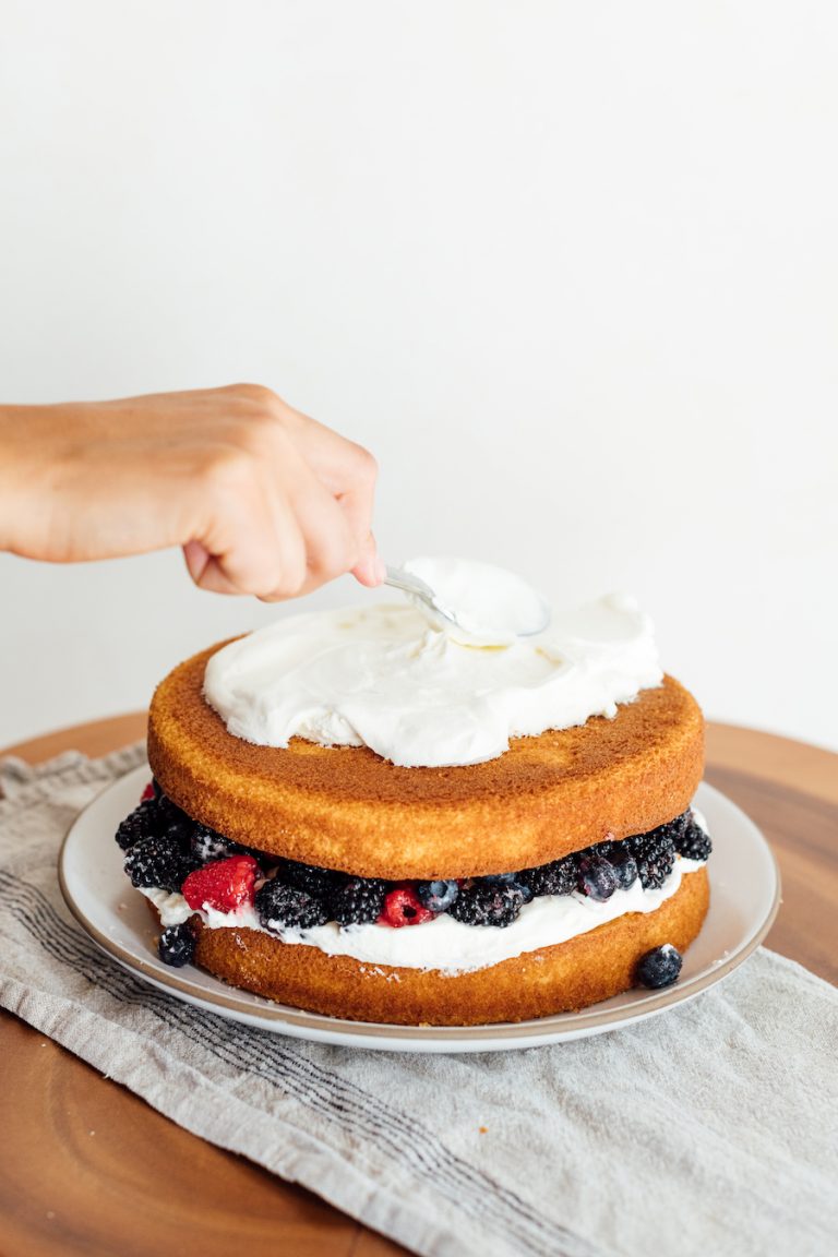 how to make an easy layer cake with whipped cream and berries