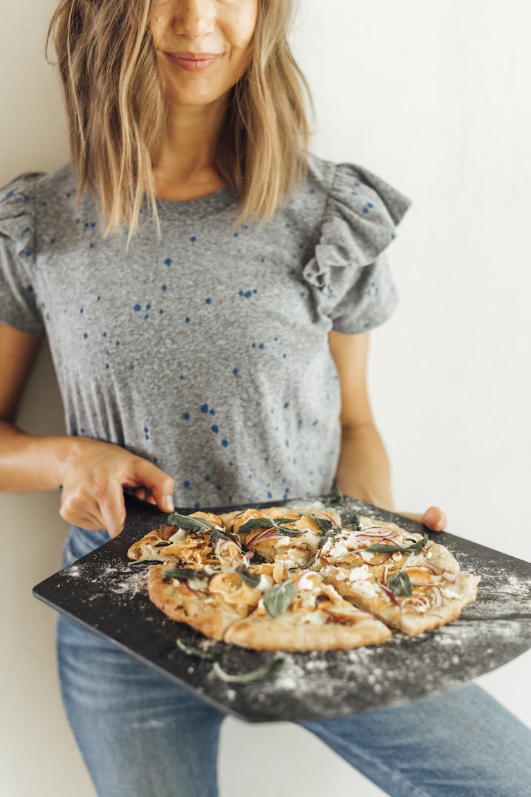 homemade fall pizza with sweet potatoes, apple, bacon and fried sage