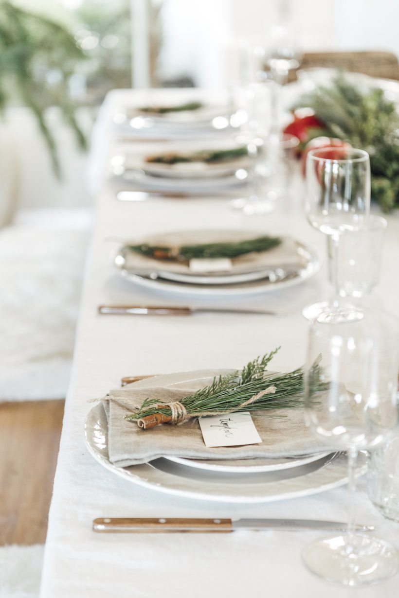 Simple Christmas Table Ideas - Scandinavian Inspired Holiday Table with Evergreen Leaf and Pomegranate - Camille Table Set