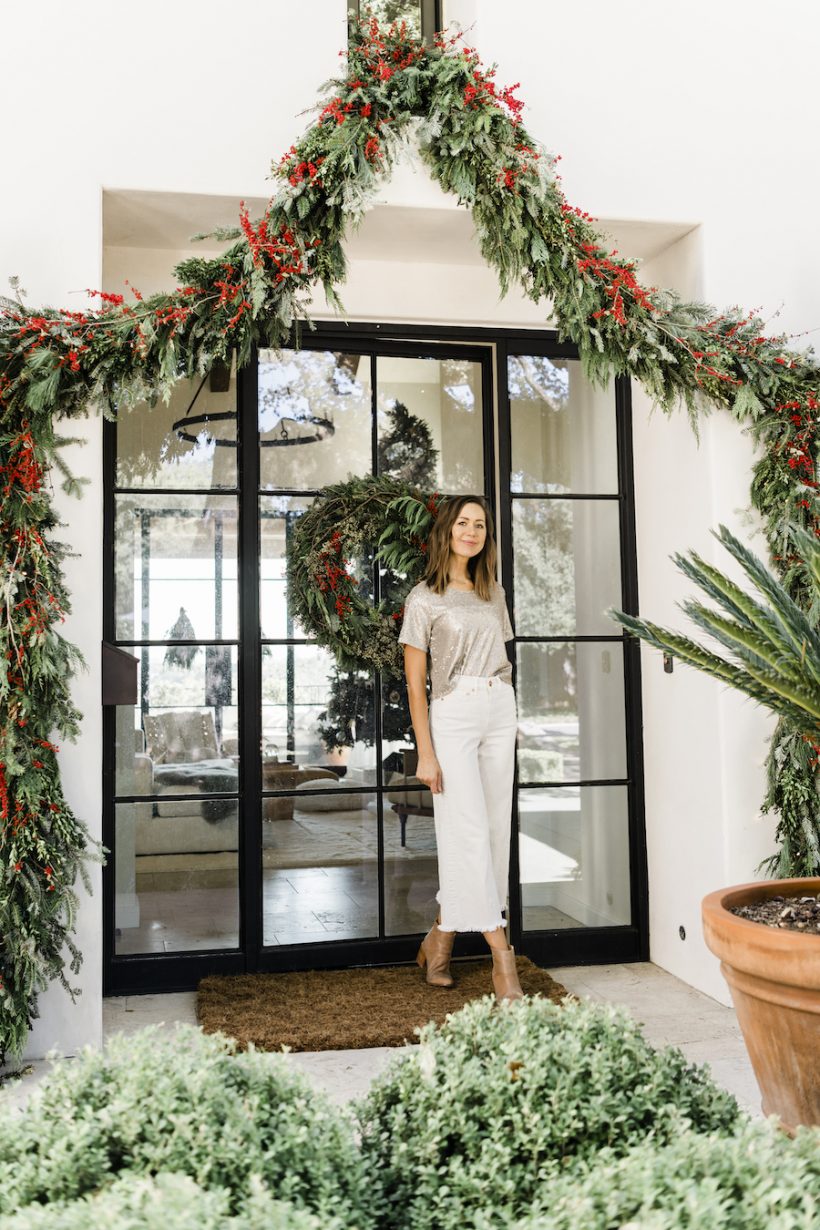 christmas evergreen garland and wreath with red berries for front door, best holiday decor front porch, how to make a christmas wreath and garland