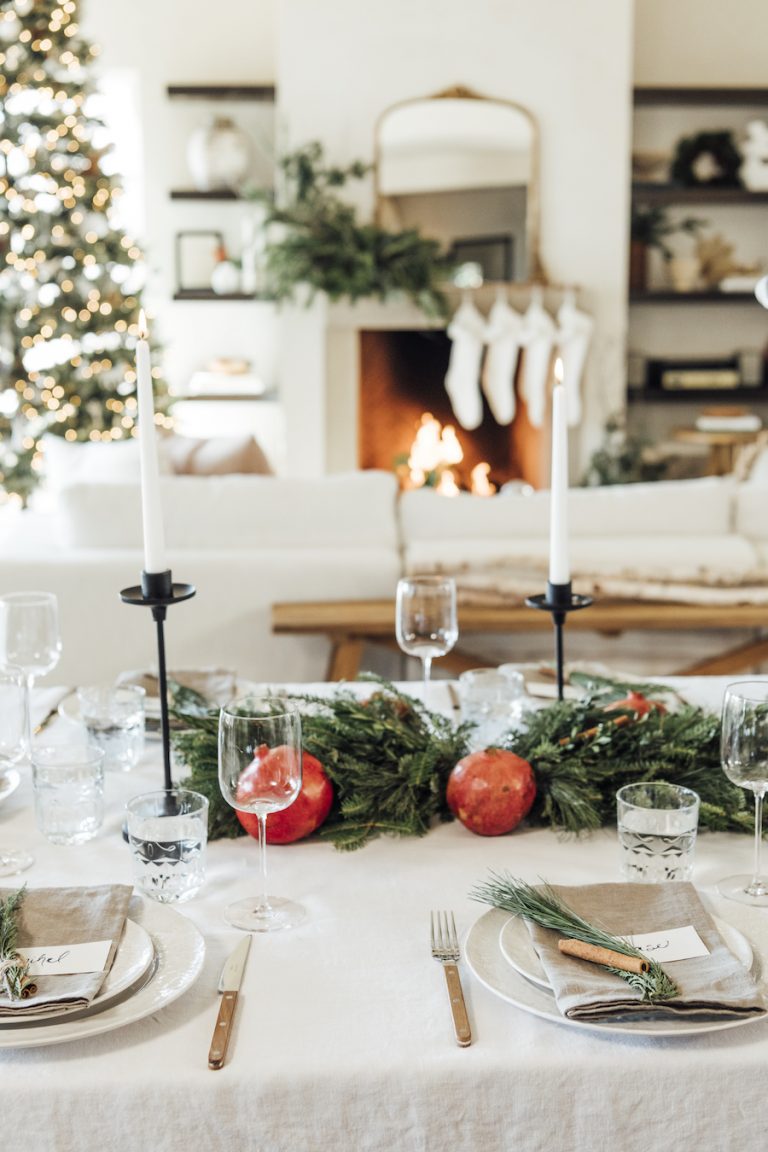 A simple Christmas table setting-scandinavian holiday table with always green table and pomegranate-camille