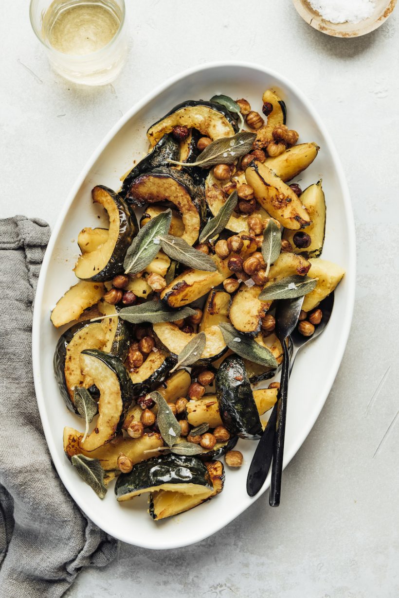 Roasted acorn squash with brown butter and hazelnuts by Half Baked Harvest, the best vegetable supplement for the holiday dinner.