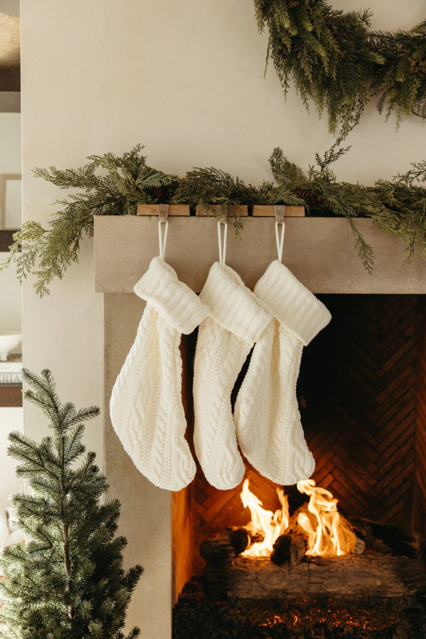 Stockings hung over the Christmas mantle