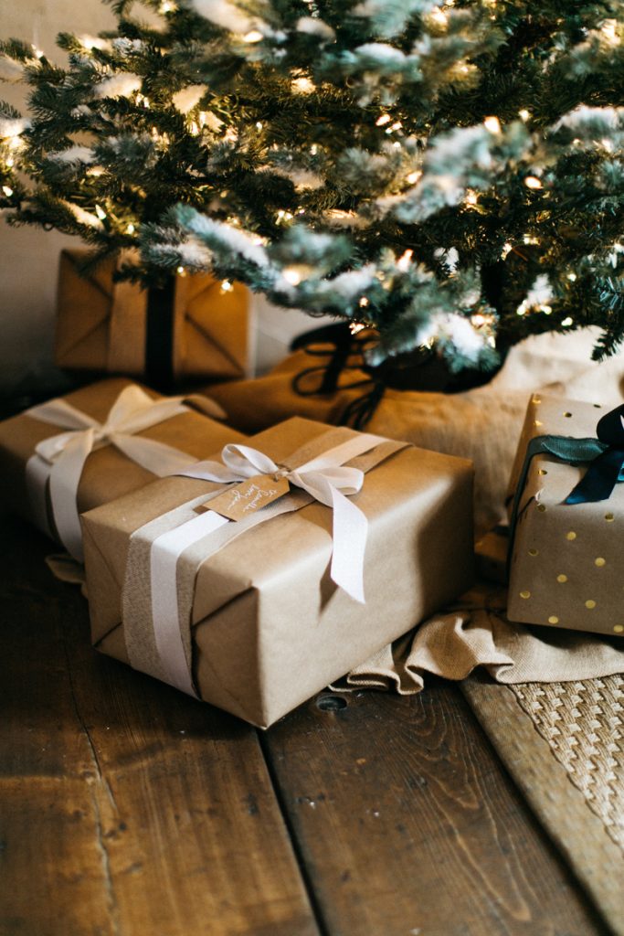 Camille Styles Christmas - presents under the Christmas tree - ways to give back during the holidays