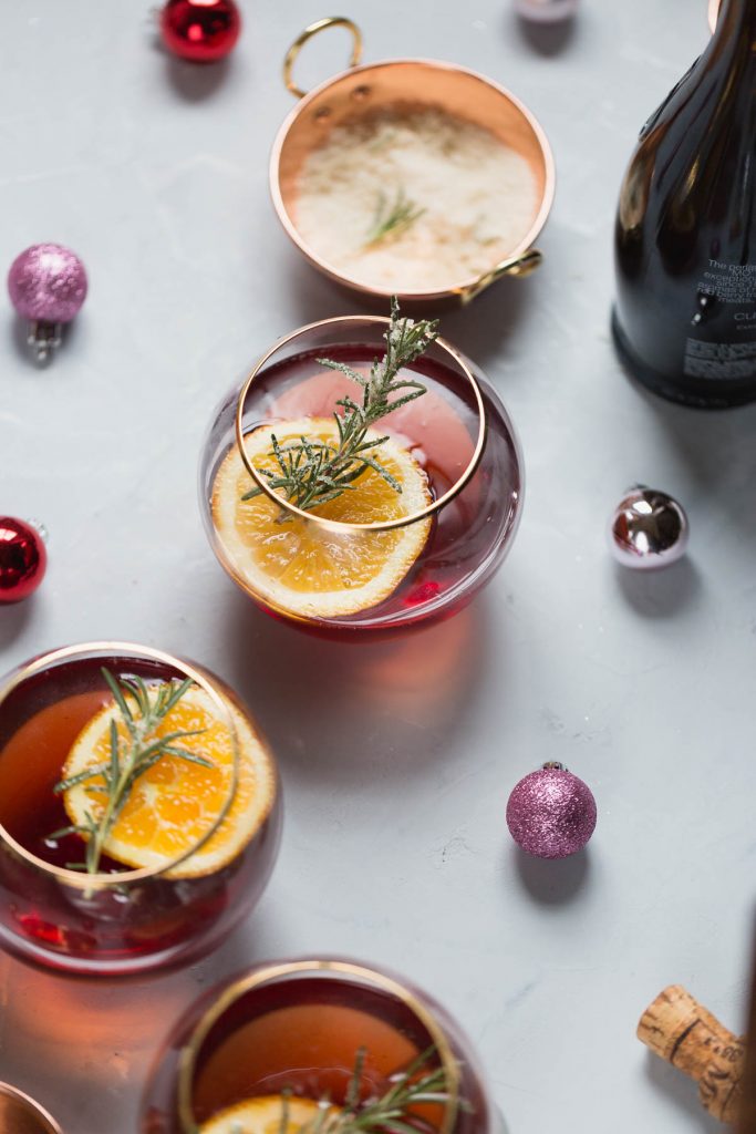 champagne cocktails_Cranberry Orange Mimosa with Candied Rosemary