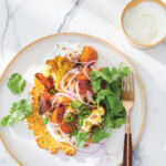 Chickpea pancakes with spiced roast cauliflower and carrots