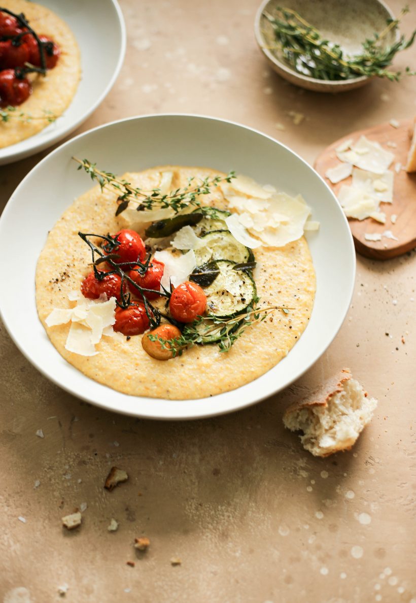 creamy polenta with parmesan and garlic, served with roasted vegetables
