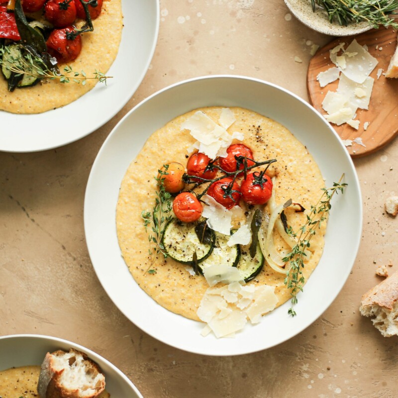 creamy polenta with parmesan and garlic, served with roasted vegetables