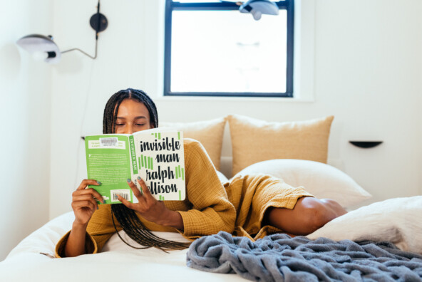 bipoc reading book novel cozy sunny bed_holiday social media detox
