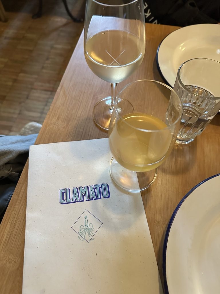 Clamato menu with white wine in Paris.