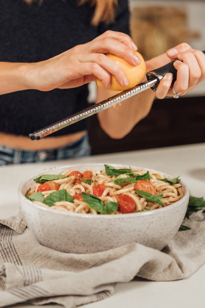 vegan creamy bucatini pasta with grilled tomatoes and basil