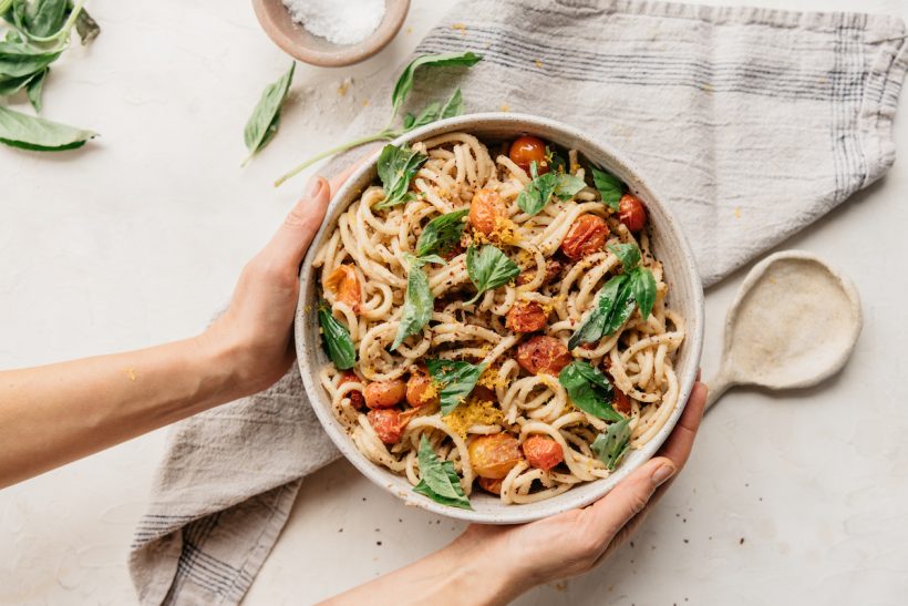 vegan creamy bucatini pasta with grilled tomatoes and basil