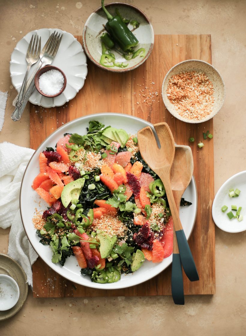 This kale and citrus salad with spicy tahini sauce is sunny on the plate