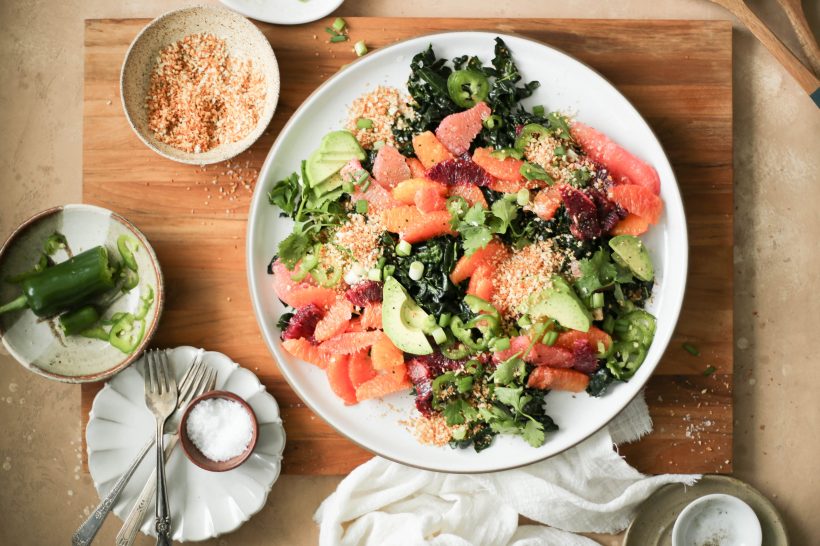 This kale and citrus salad with spicy tahini sauce is sunny on the plate