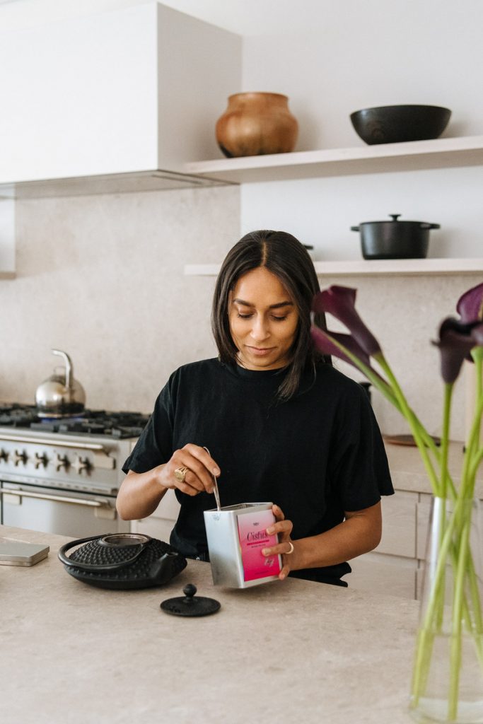 Shani Van Breukelen makes tea in her kitchen_out of a funk