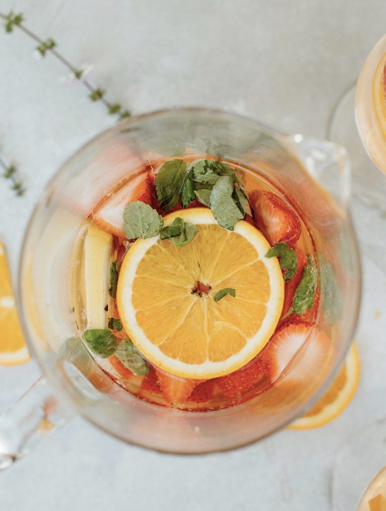 Pitcher filled with pink sangria recipe