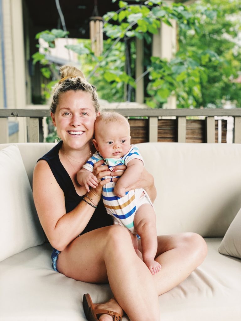 Edie Horstman sitting on the porch with her son